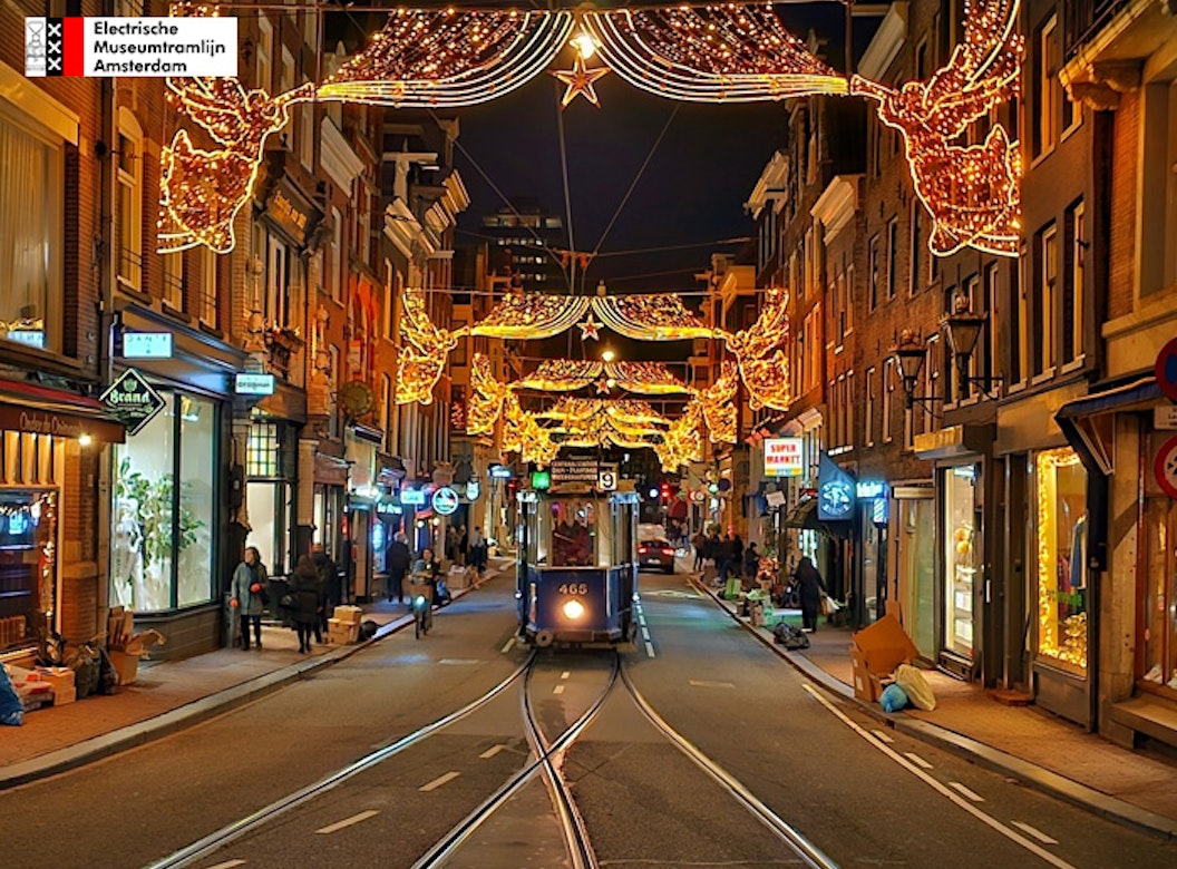 Historische tramrit door verlicht Amsterdam + drankje