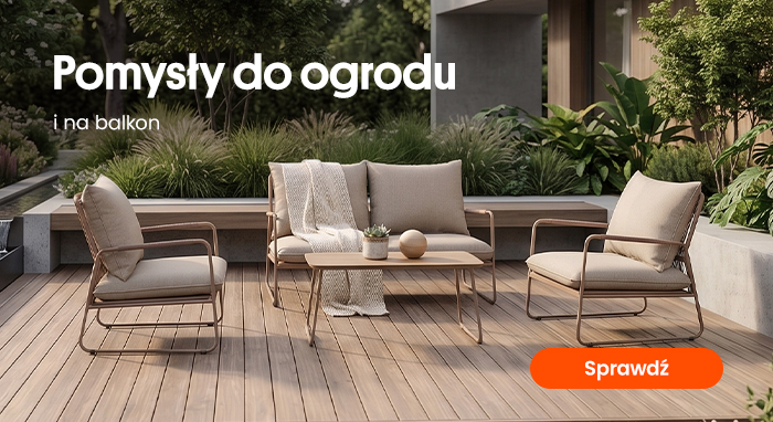 Modern beige outdoor lounge set (sofa, two armchairs, coffee table) on wooden deck surrounded by lush garden plants