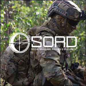 an image of a soldier in camouflage holding a rifle