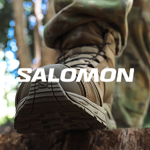 an image of a person standing on a tree stump with a shoe on