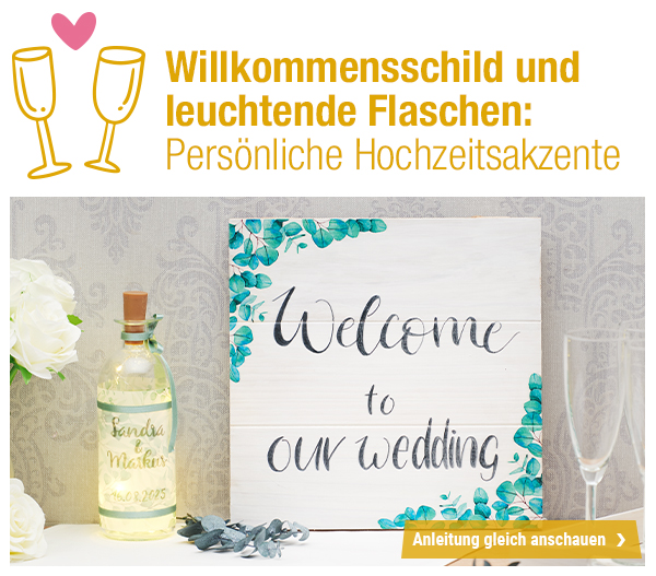 Willkommensschild & leuchtende Flaschen: Persönliche Hochzeitsakzente