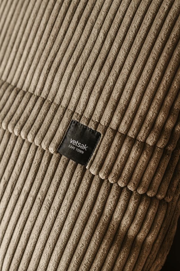 an image of a close up of a pillow with a label on it