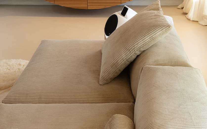 pique wheat outdoor sofa with sunset