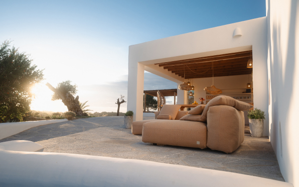 pique wheat outdoor sofa with sunset