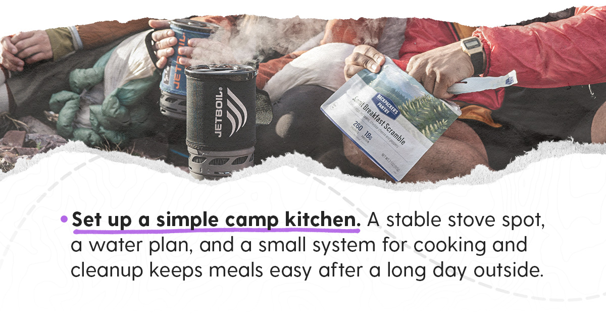 3. Set up a simple camp kitchen. A stable stove spot, a water plan, and a small system for cooking and cleanup keeps meals easy after a long day outside.