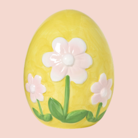 Beeldje ei met bloem