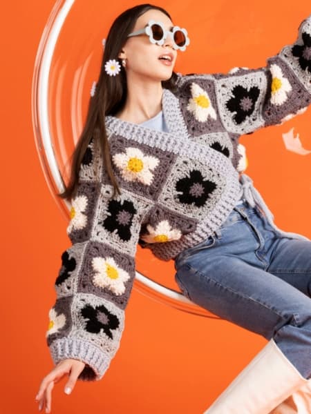 https://www.yarnspirations.com/products/red-heart-flower-power-crochet-wrap-cardigan