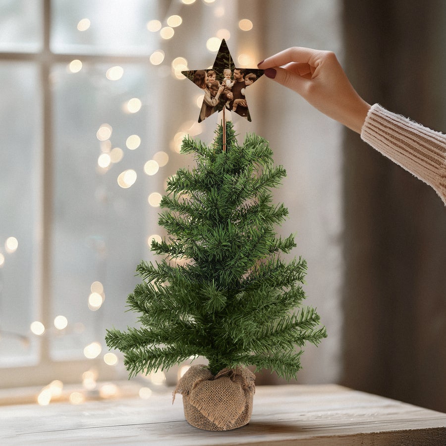 Kerstboom met gepersonaliseerde piek