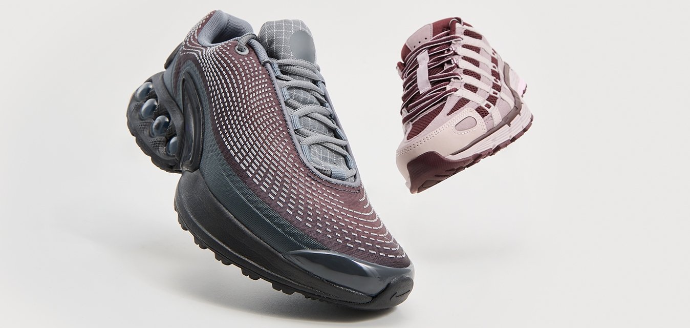 Scarpe sportive con una tomaia grigia e nera a motivo e una suola nera lucida; un secondo design in bordeaux con accenti chiari alternati.